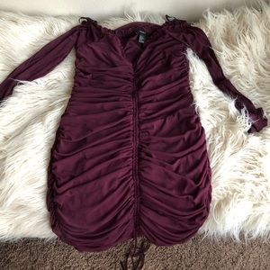 Deep wine colored ruched body con dress